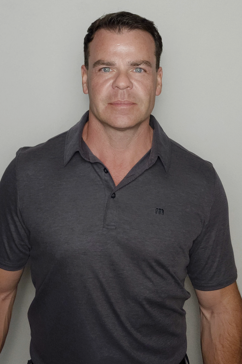 Dr. Ryan Jones standing portrait.
