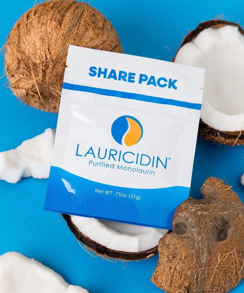 Four Lauricidin mini pouches of original monolaurin pellets.